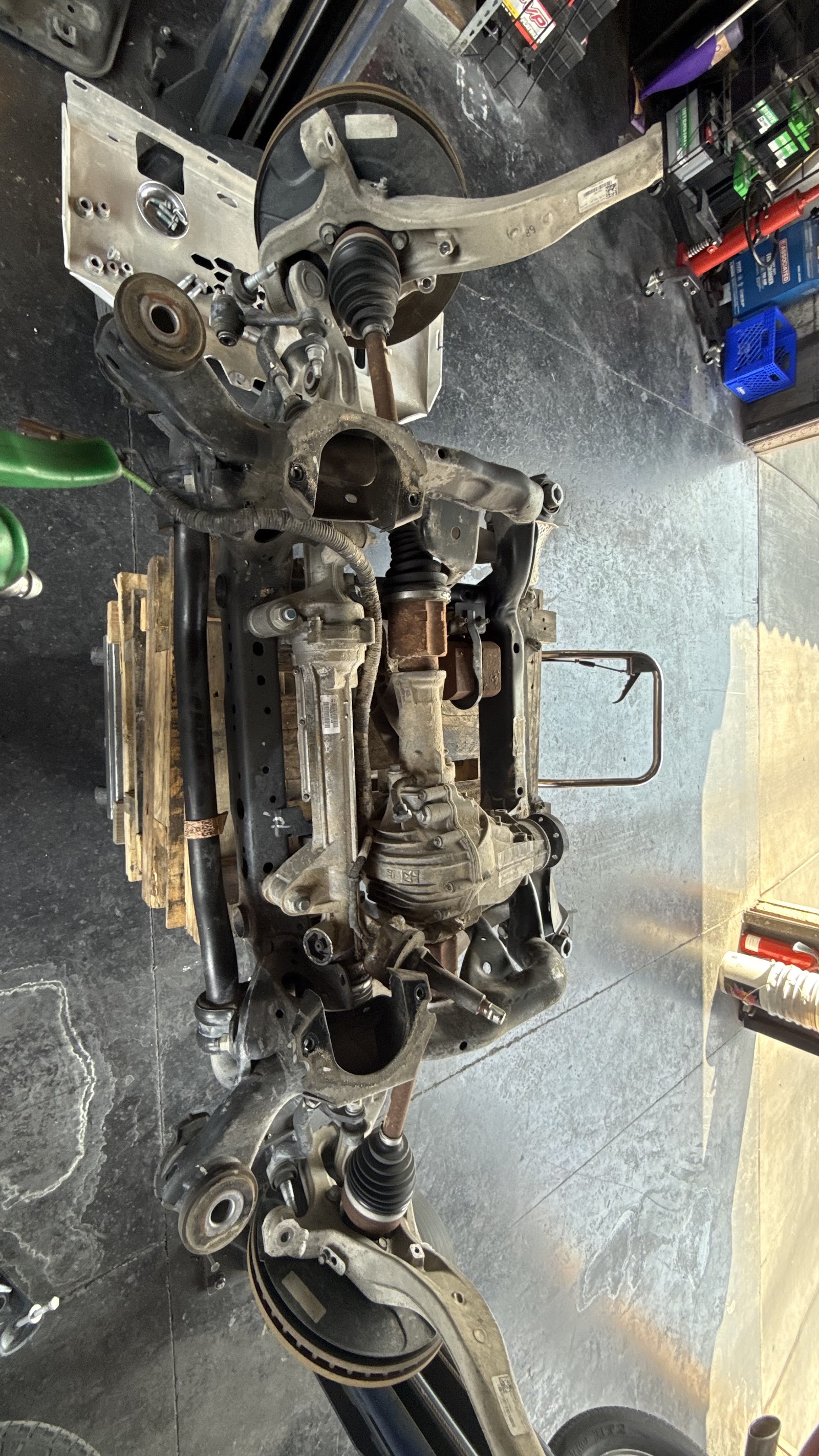 Front subframe with suspension, axles and differential removed from the vehicle